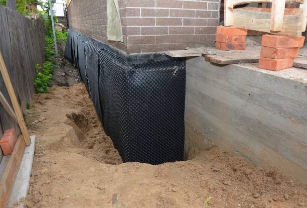 SJ Waterproofing Pros technician performing targeted Exterior Waterproofing assessment in Chatham, VA